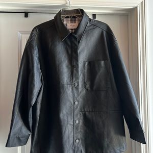 Women’s black XL KanCan leather like jacket.